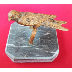 Oiseau bronze doré sur socle marbre